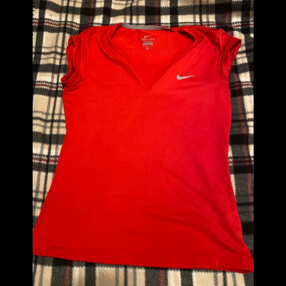 Red Nike v neck dri fit women’s medium shirt